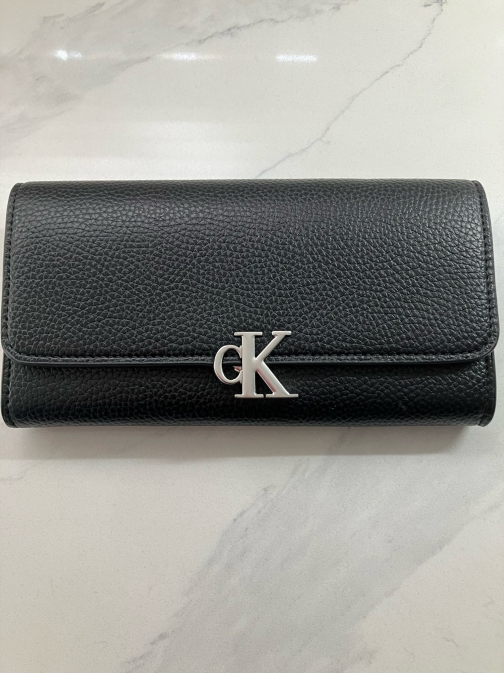 New with tags : Calvin Klein Black Pebbled Trifold Wallet with Silver CK Emblem